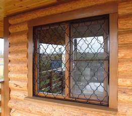 Решетка на окно деревянного дома